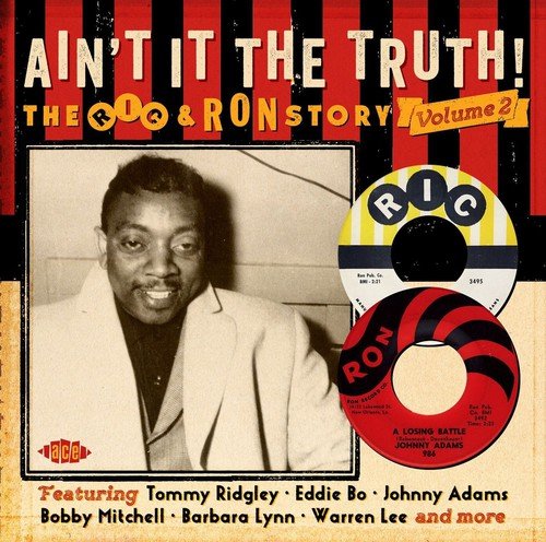 CD cover featuring a portrait of a man in a suit, record labels, and text.