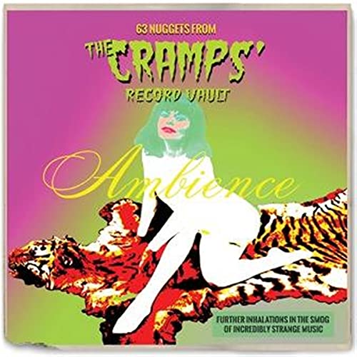 CD cover featuring a silhouette of a woman on a tiger rug, pink background.