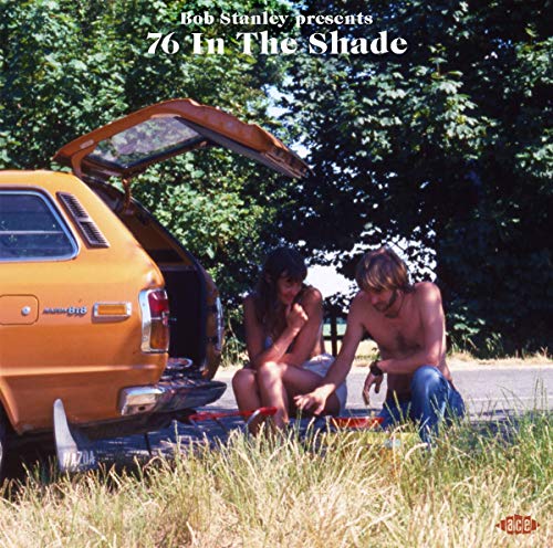 CD cover: vintage car with two people, sunny roadside scene.