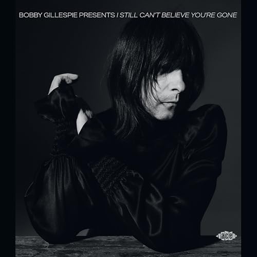 CD cover featuring a black and white portrait of a man with long hair.