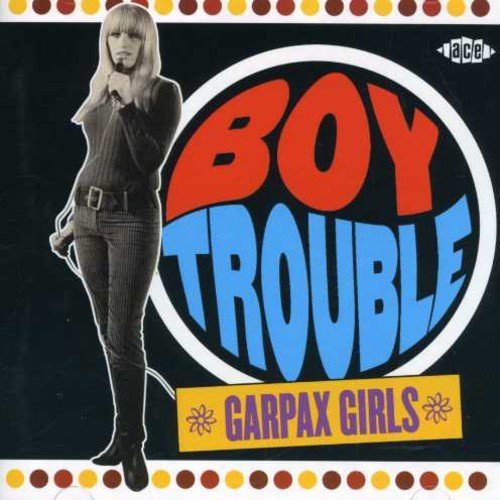 CD cover featuring a woman holding a microphone with large Boy Trouble text.