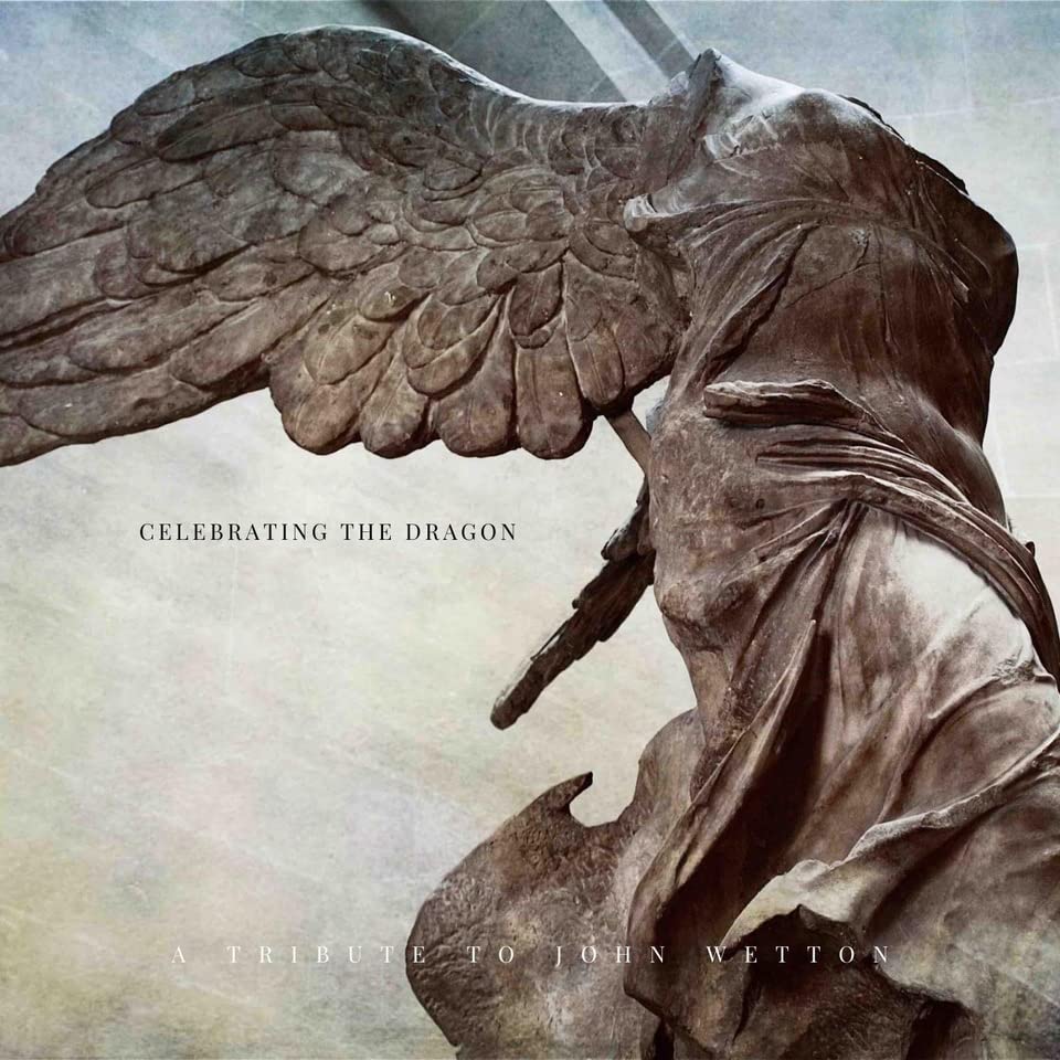 CD cover: Stone statue with wings, text “Celebrating The Dragon”.