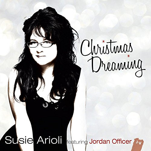 CD cover: woman with dark hair, glasses, and "Christmas Dreaming" text.