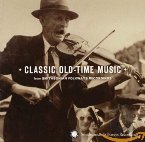 Sepia-toned photo of a man in a hat playing a fiddle, with album text overlay.