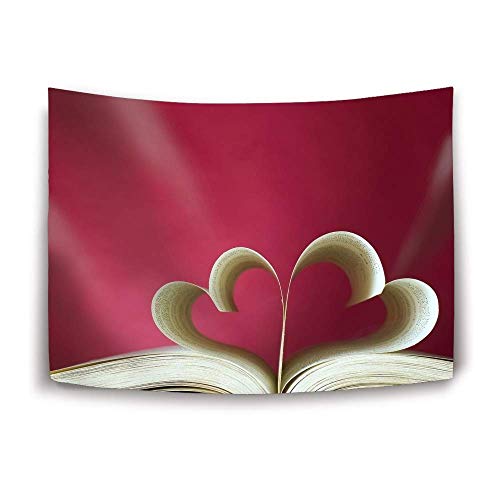 Open book with pages folded into heart shapes against a dark pink background.