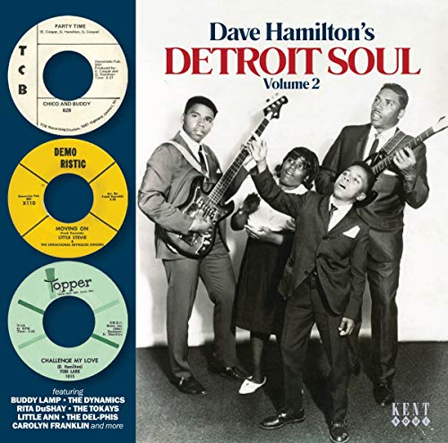 Album cover featuring four musicians in suits and three vintage vinyl record labels.