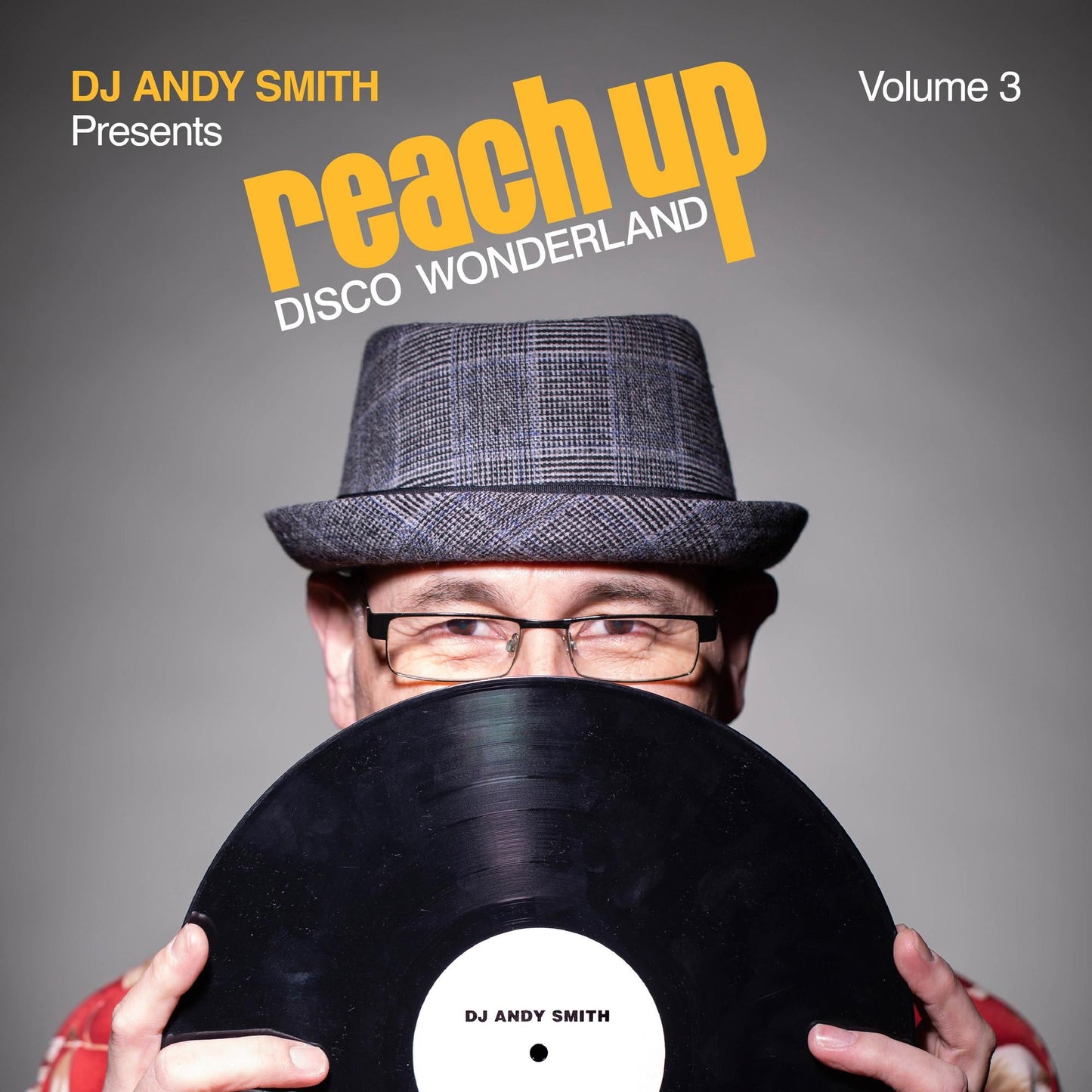 DJ Andy Smith album cover featuring a man holding a vinyl record.