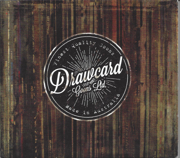 CD cover with a circular logo reading "Drawcard Goons Ltd." on woodgrain.