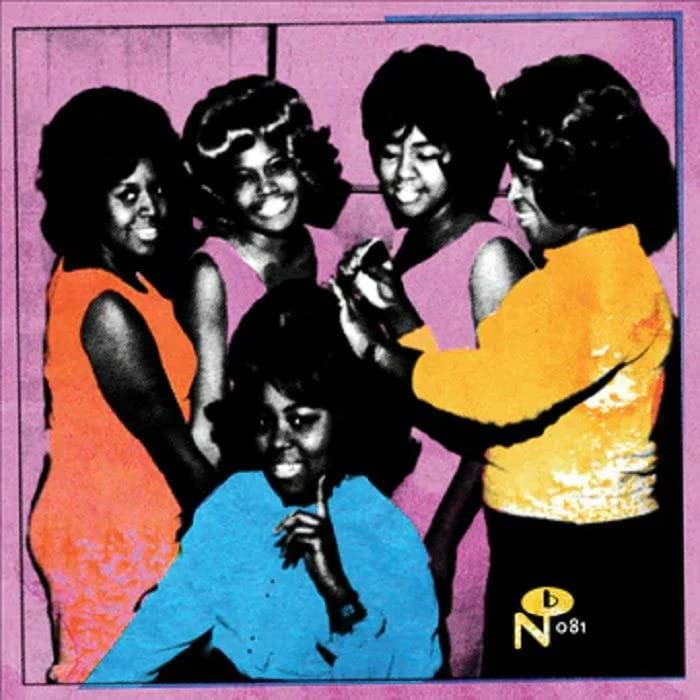 Five women with beehive hairstyles pose against a pink background in this album cover.