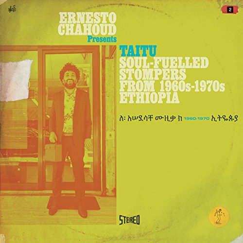 Yellow album cover with man standing in doorway and Ethiopian text.