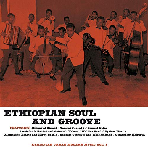 Vintage record album cover featuring a large Ethiopian band in suits.
