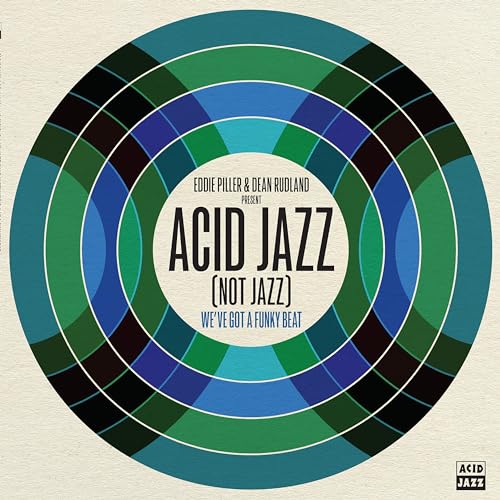 Vinyl record label with concentric blue and green rings, text “Acid Jazz”.