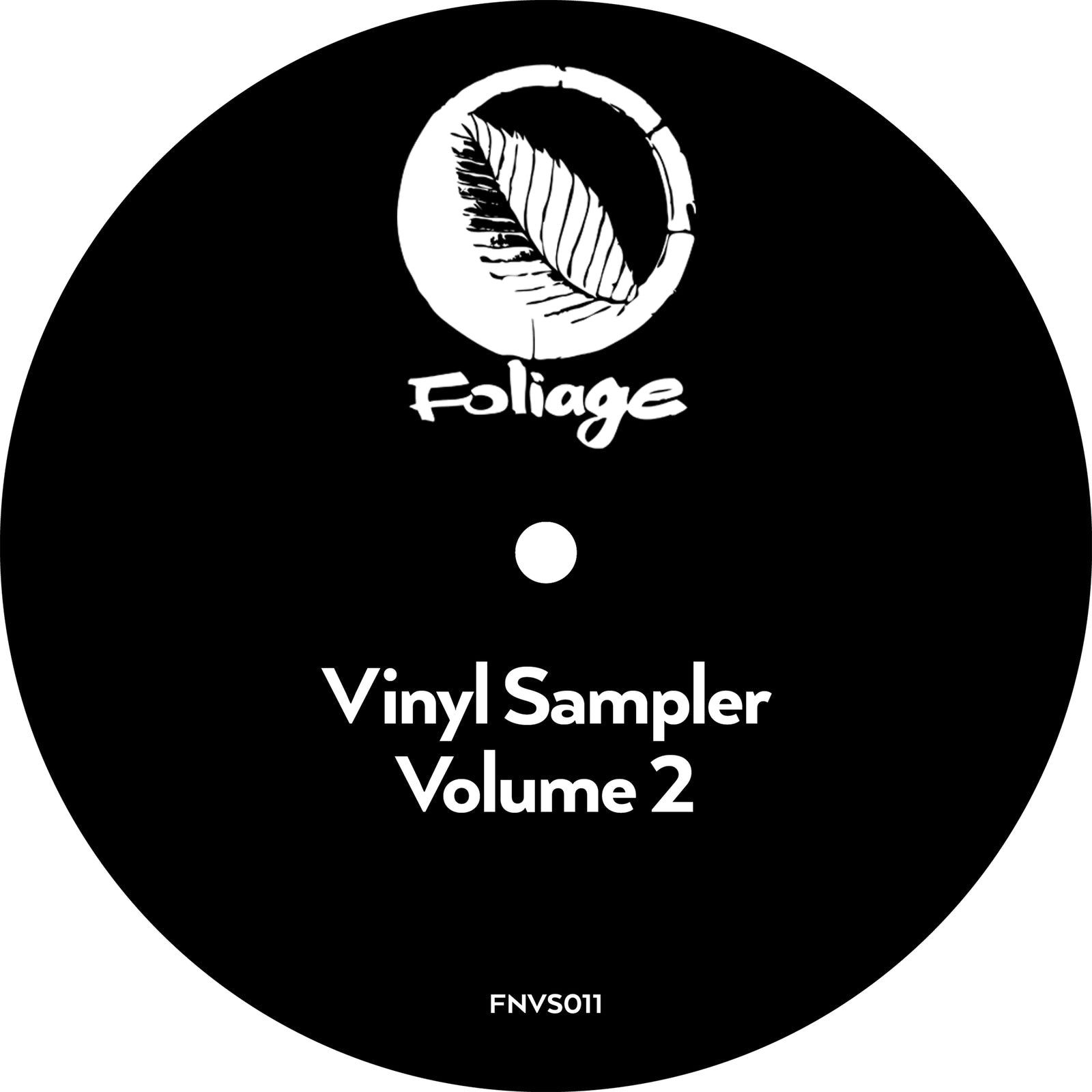 Black vinyl record label with white leaf graphic and text.