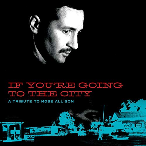 Vinyl album cover with black background, man portrait, and cityscape in blue tones.