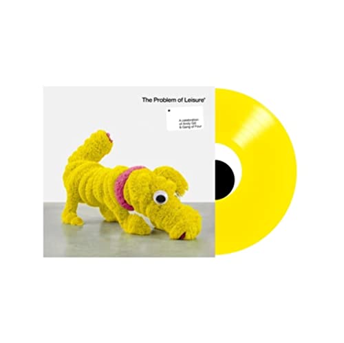 Yellow vinyl record with album cover featuring a knitted dog sculpture.