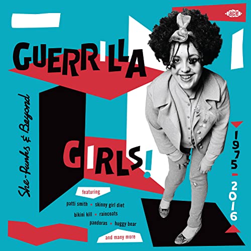 CD cover featuring a smiling woman with an afro and bold graphic design.