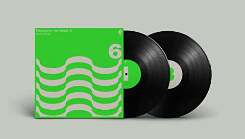 Green and white vinyl record cover with two black vinyl discs.