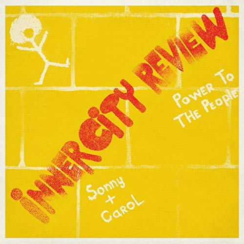 Yellow brick wall background with red text "INNER CITY REVIEW" and a stick figure.