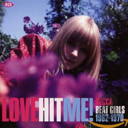 CD cover featuring a young woman with flowers and bold text: "LOVE HIT ME!