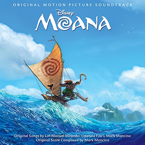 Moana and Maui on a sailboat in the ocean under a blue sky.