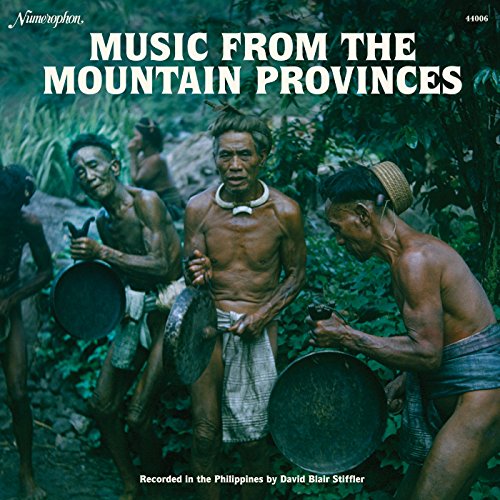 Vinyl record cover: group of Filipino musicians with drums, lush greenery.