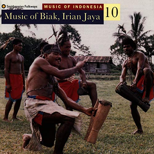 CD cover: men drumming and dancing in a village setting.