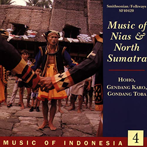 CD cover featuring a man in traditional Nias clothing playing instruments.
