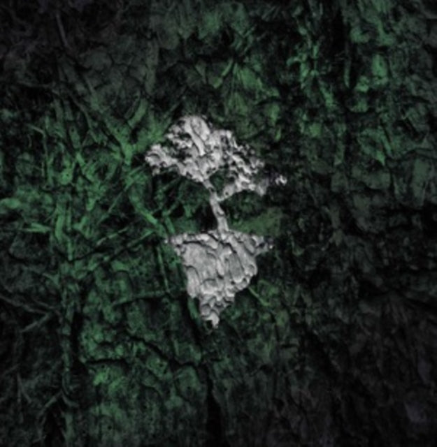 Dark green textured album cover with a white, sculpted tree image.