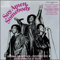 Black and white album cover featuring three singers with microphones.