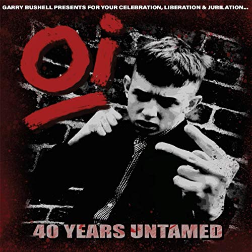 Album cover: young man pointing, red "Oi!" text, brick wall background.