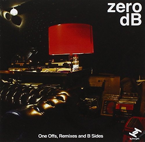 CD cover: red lamp on a desk with audio equipment, dark background.