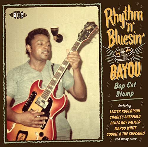 CD cover featuring a guitarist performing with vintage text and design.