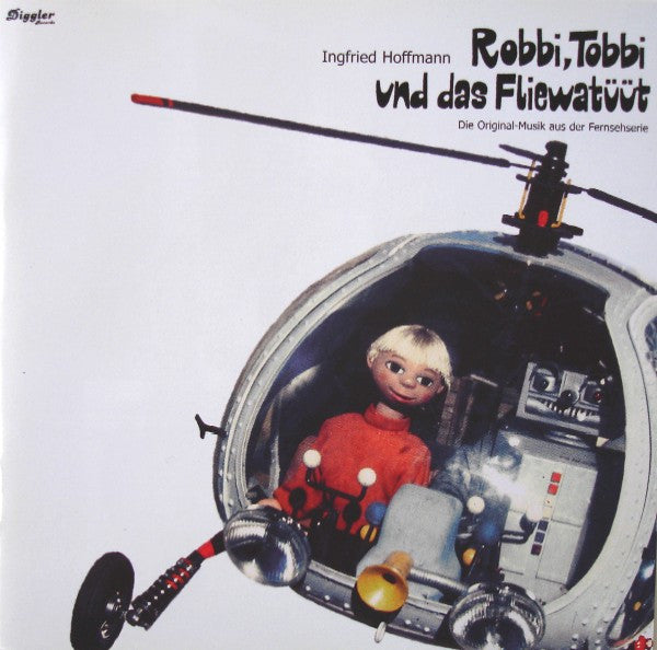 CD cover: Robbi, Tobbi und das Fliewatüv, featuring a doll in a cockpit.