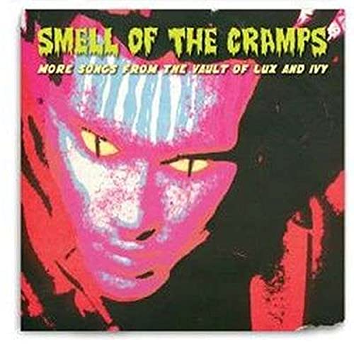 CD cover with a stylized pink face, yellow eyes, and green text on black.
