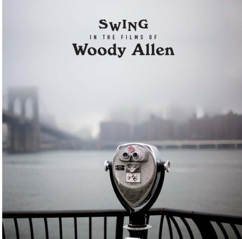 Vinyl record cover with binoculars and blurred New York City skyline.