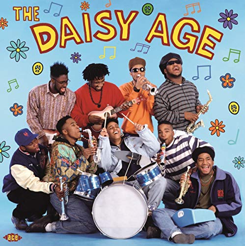 "Album cover with 'The Daisy Age' title, group of young men playing instruments."