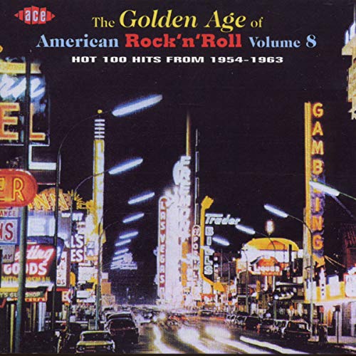CD cover: nighttime city street scene with bright neon lights.