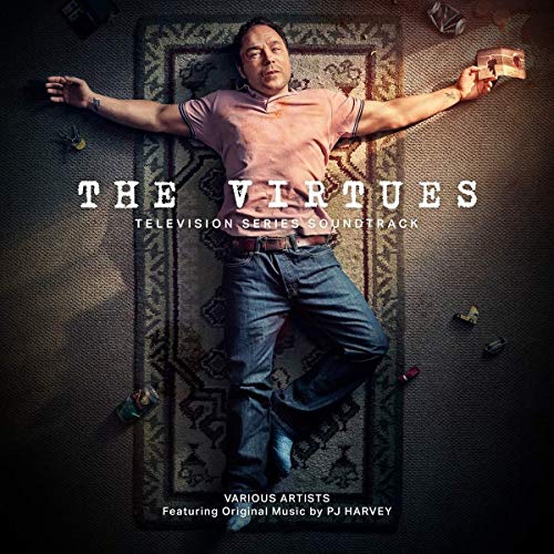CD cover for “The Virtues” soundtrack, featuring a man lying on a rug.