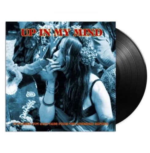 Vinyl record with cover art featuring a woman and floral design.