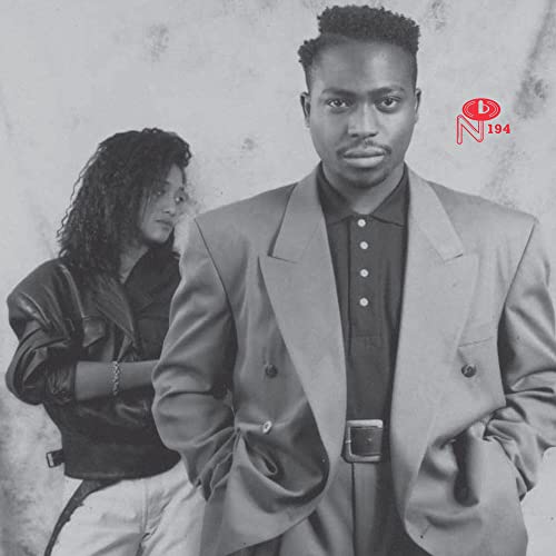 Black and white portrait of a man and woman, album cover art.