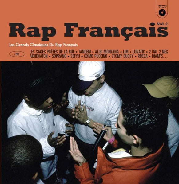 Vinyl record cover: "Rap Français Vol. 2" featuring a group with microphones.