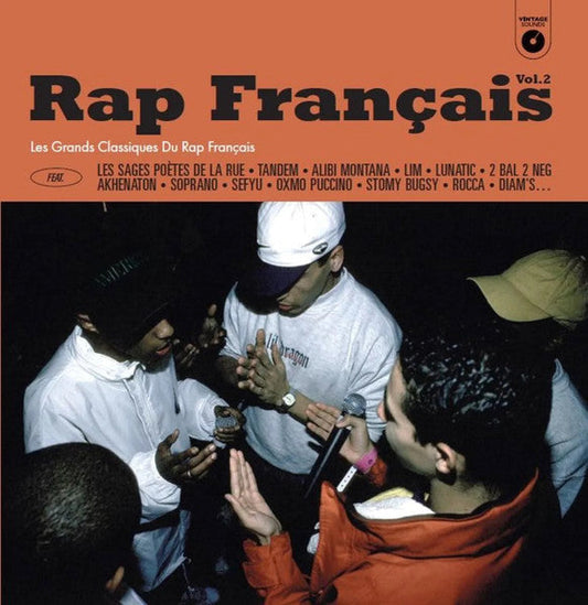 Vinyl record cover: "Rap Français Vol. 2" featuring a group with microphones.