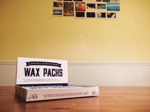 A white box labeled Wax Packs by Secret Audio Club sitting on a table.