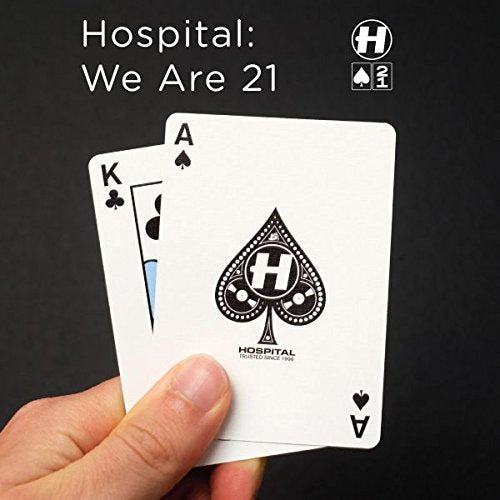 "Hand holding two playing cards against a black background, with 'Hospital: We Are 21' text."