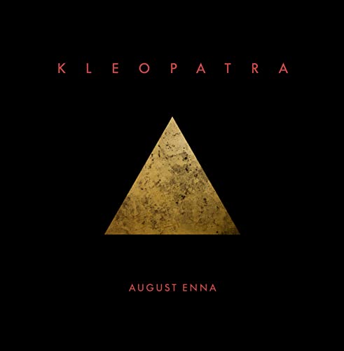 Black albumSH album cover with a gold textured triangle and red text.