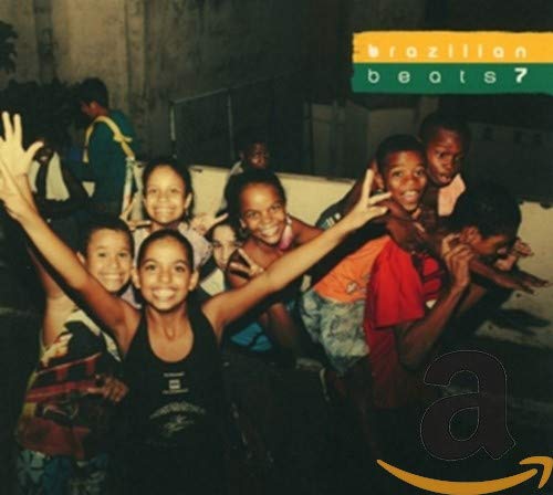 CD cover: Group of children smiling and raising hands outdoors.