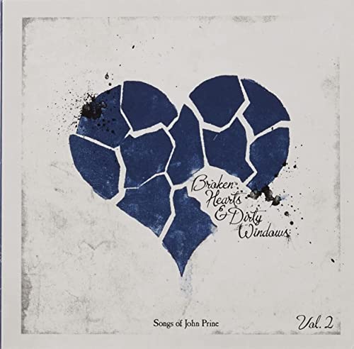 CD cover with a fractured blue heart and handwritten text.