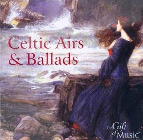 CD cover: woman in blue overlooking a stormy seascape.