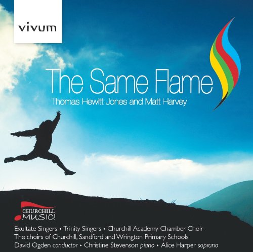 CD cover: blue sky, silhouette of a leaping figure, and colorful flame design.