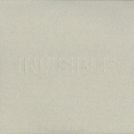 Vinyl record cover with embossed text reading "INVISIBLE" in a square.